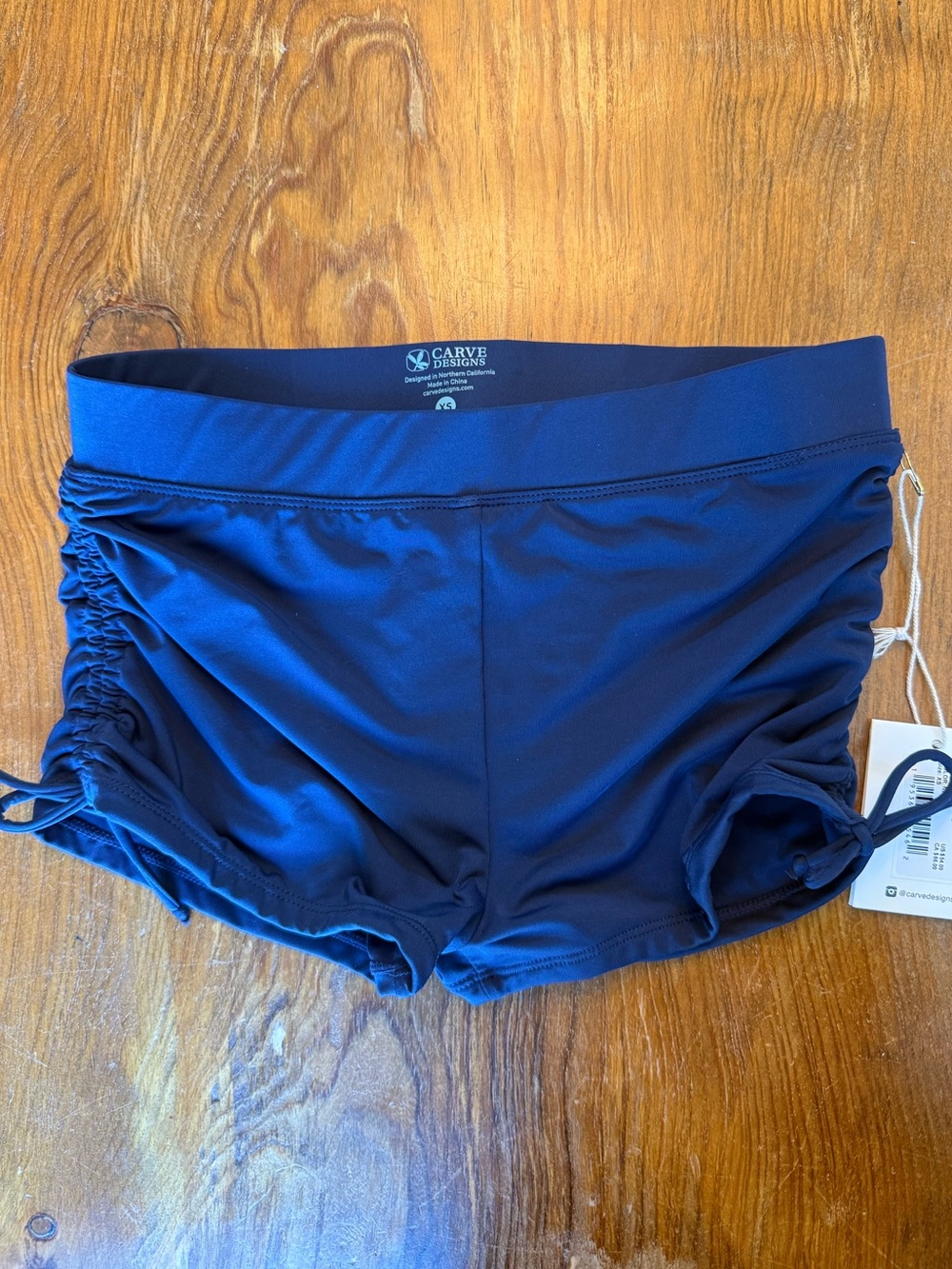 Carve Designs Navy Swim Shorts with Side Ruching Size XS NWT